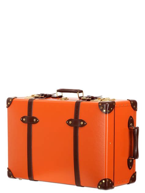 globe trotter suitcases on wheels.